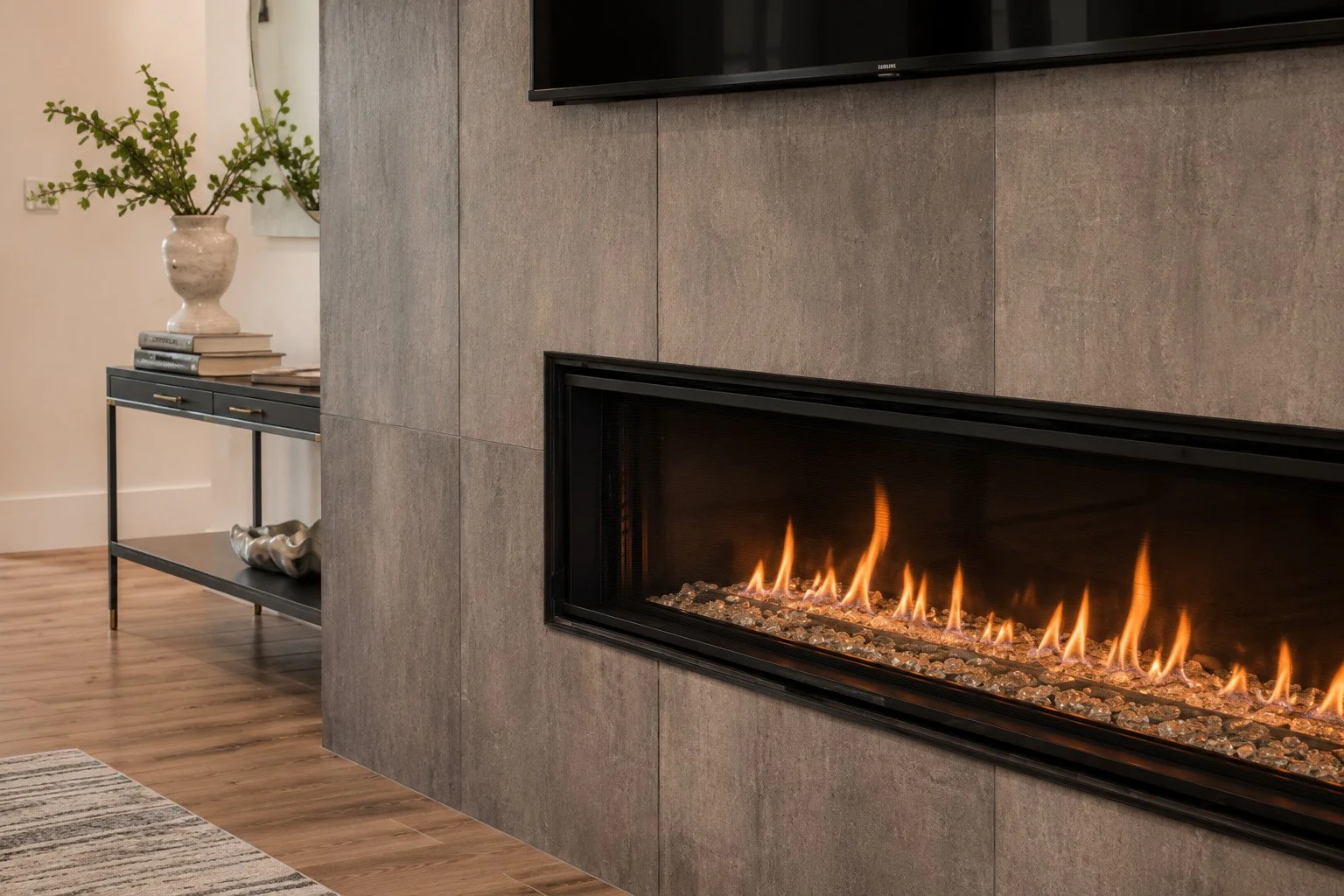 Modern linear gas fireplace in gray tiled wall, Franktown, Colorado