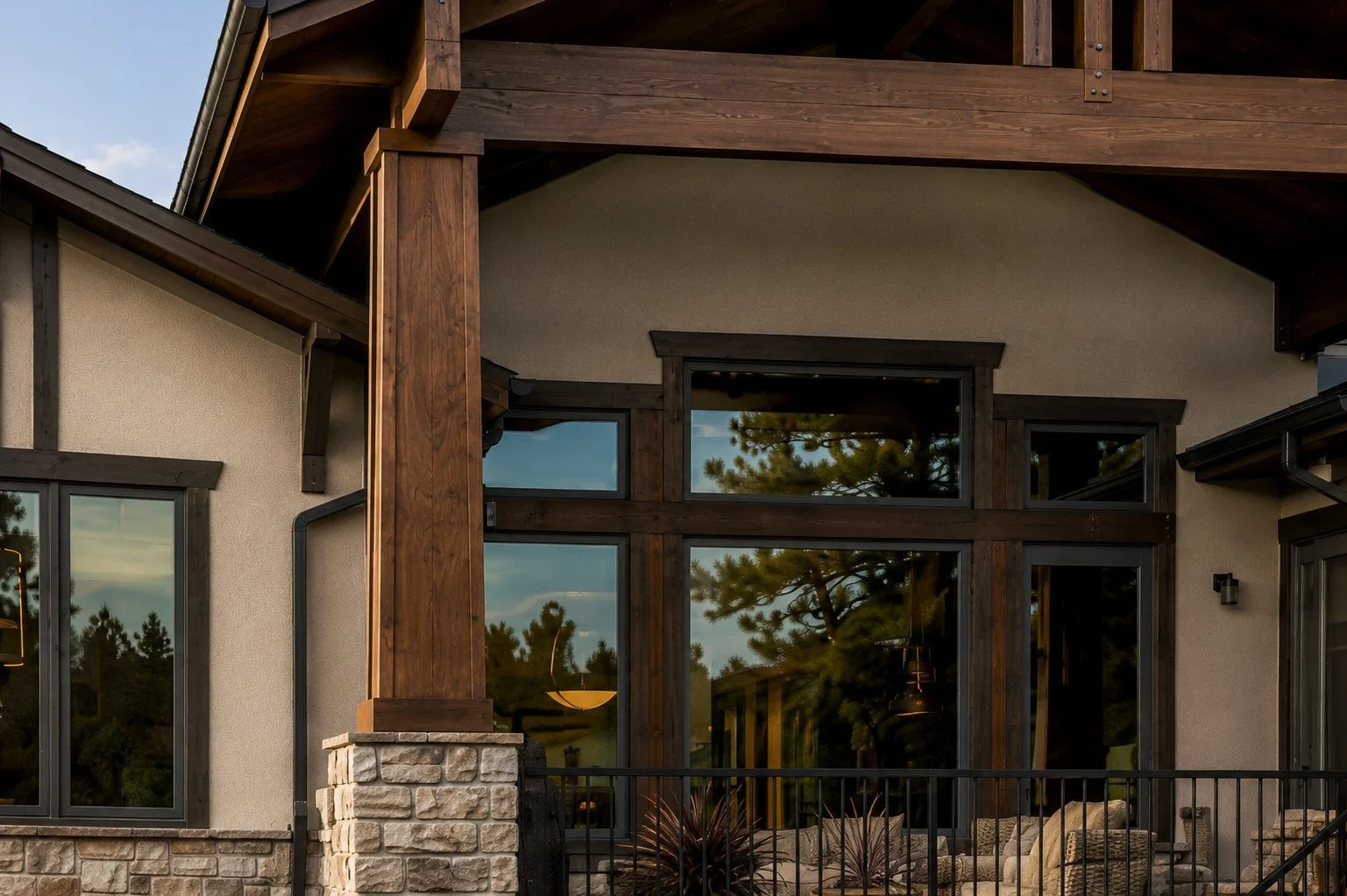 Custom covered outdoor patio with timber roof structure and custom fabricated railing, Castle Rock, Colorado