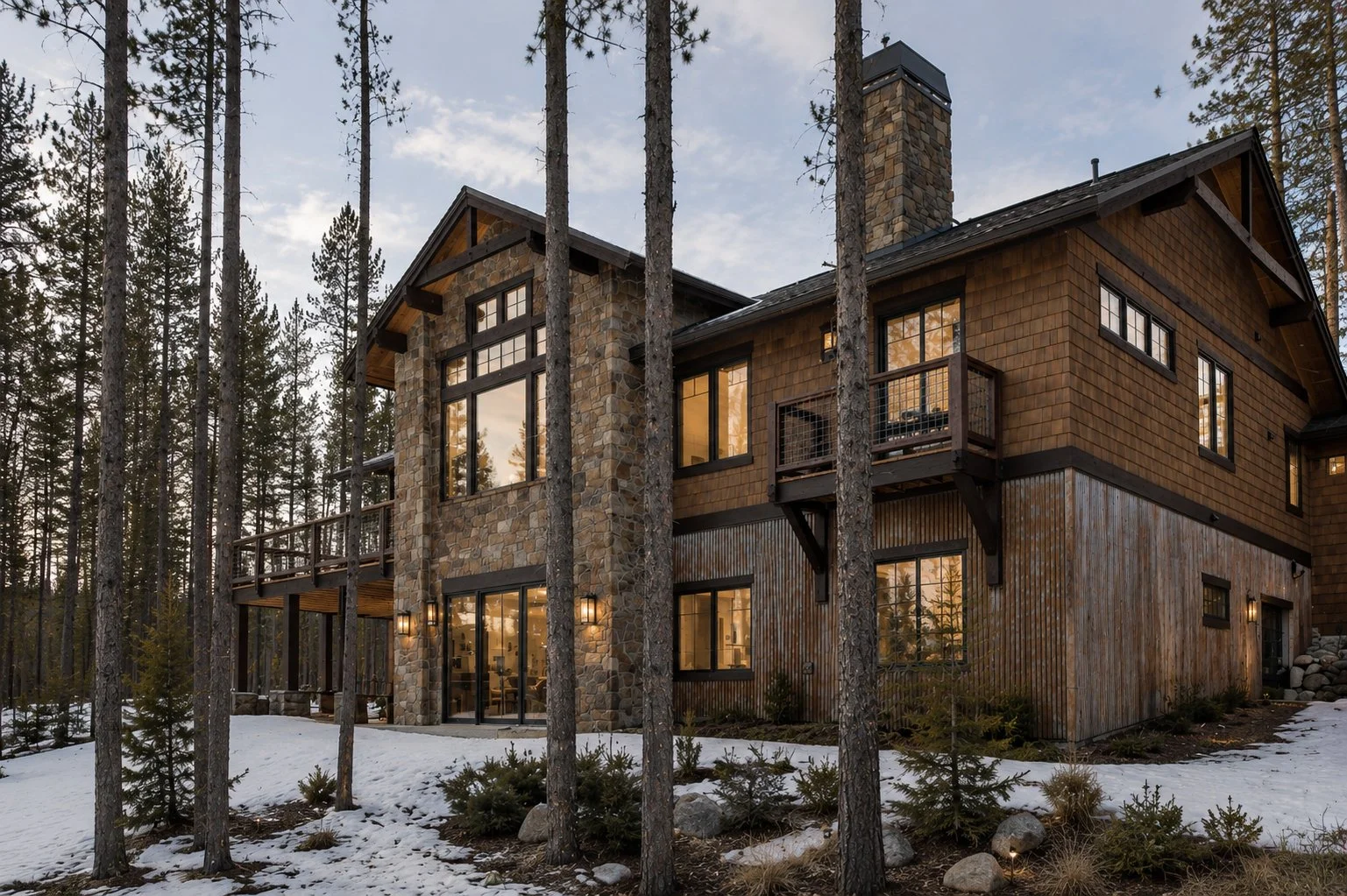 Custom mountain modern home exterior in winter, Fraser, Colorado