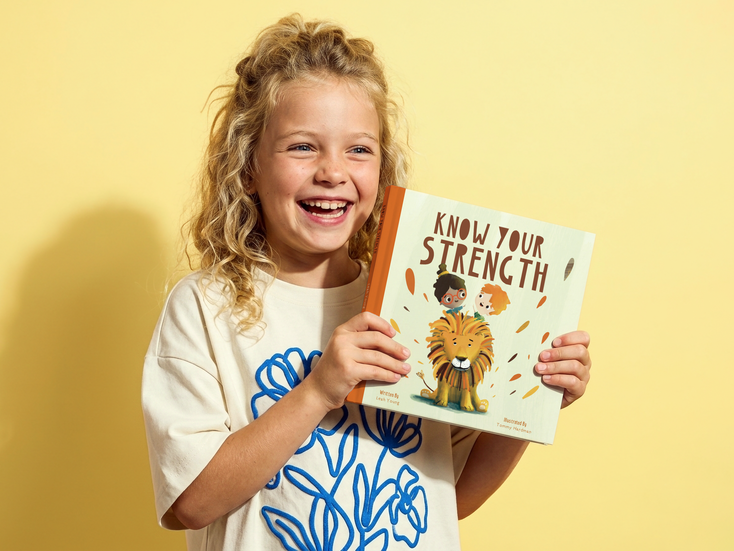 0030_Square_book_mockup_girl_yellow_background.png