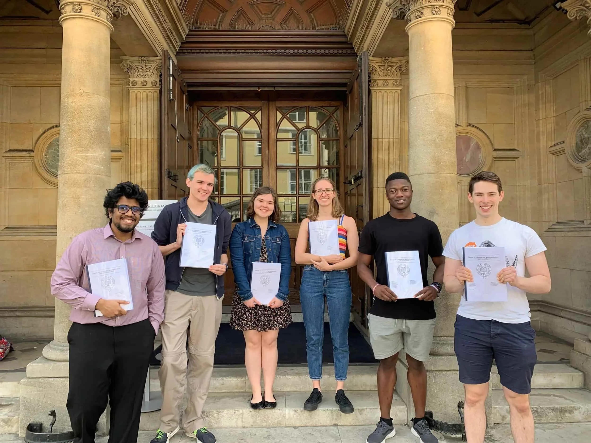 Affnafee and teammates formally submitting their 3rd year group project thesis at Examinations School, Oxford University. 