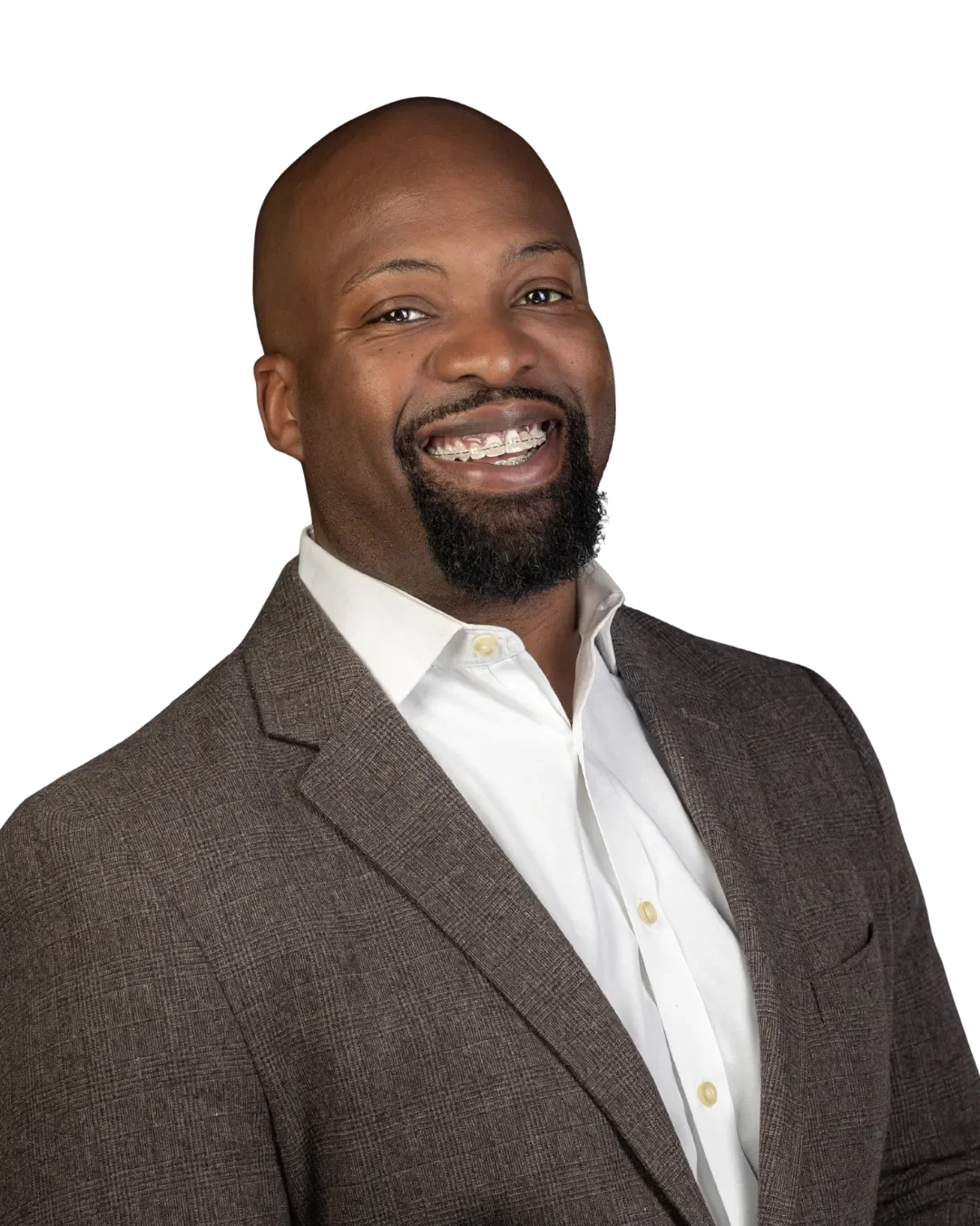 A smiling African American man wearing a brown suit jacket and white shirt, with a goatee and short hair.
