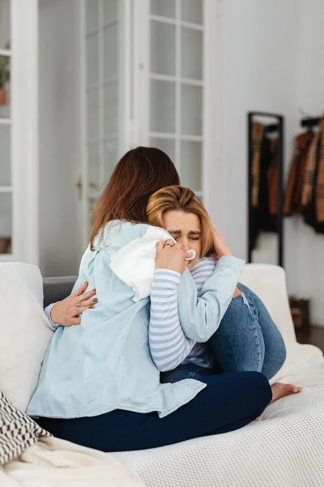 two women embracing