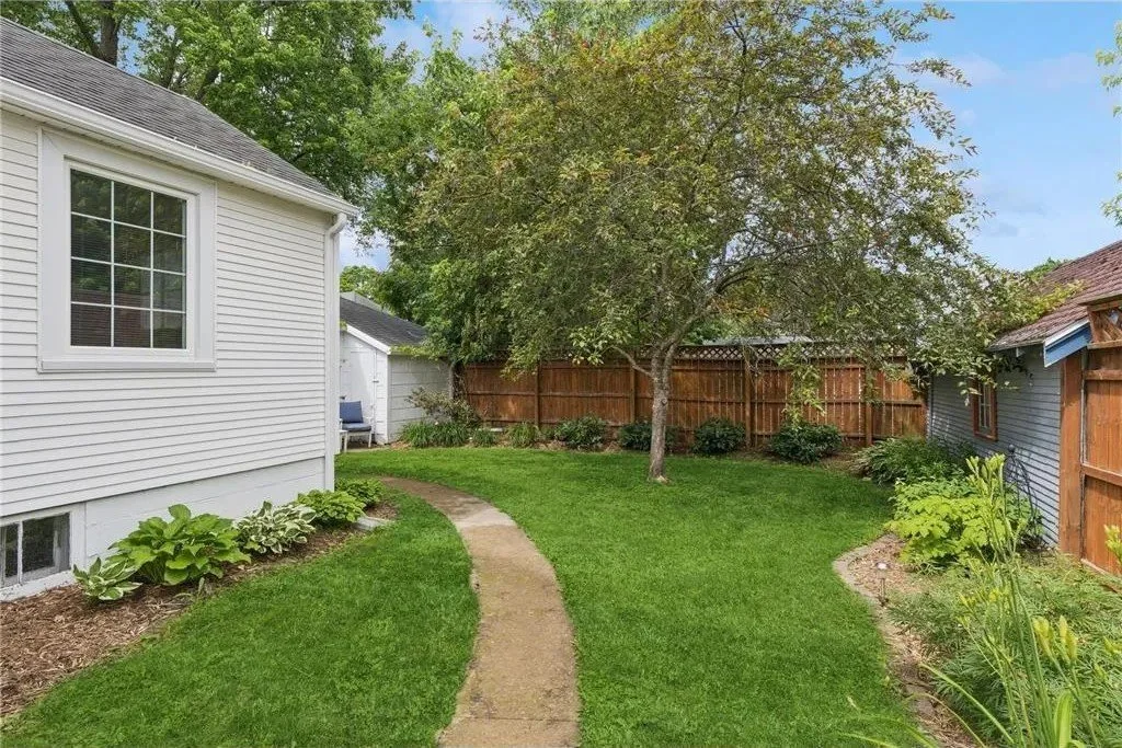 Private outdoor patio and landscaped backyard