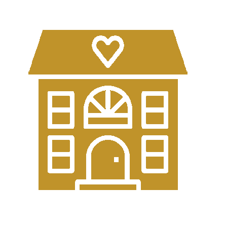 A gold-colored house with a heart on the roof and a front door.