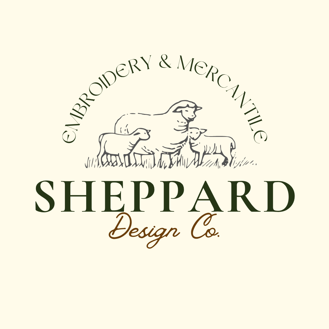 Logo for Sheppard Design Co., featuring a line drawing of sheep and the text 'Embroidery & Mercantile Sheppard Design Co.' on a light background.