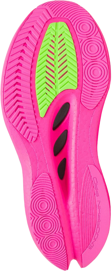 The bottom sole of a pink and green athletic shoe with black accents.