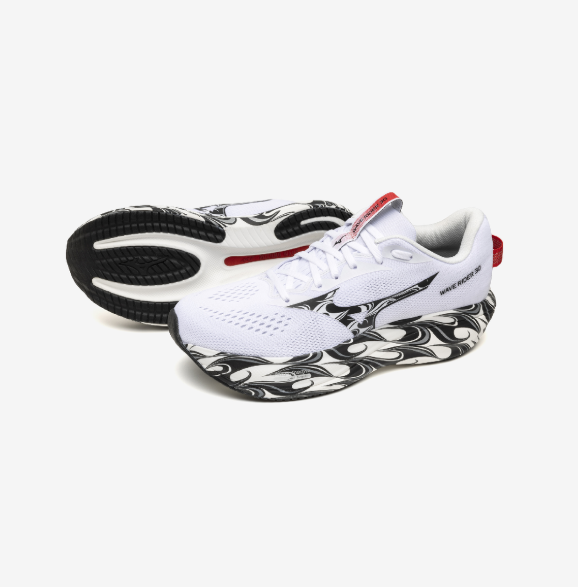 A pair of white athletic shoes with black and red accents, featuring a black and white marbled sole design.