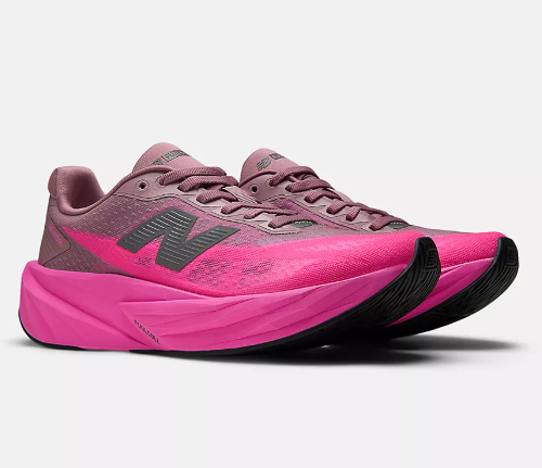 Pink and gray New Balance running shoes with black soles.