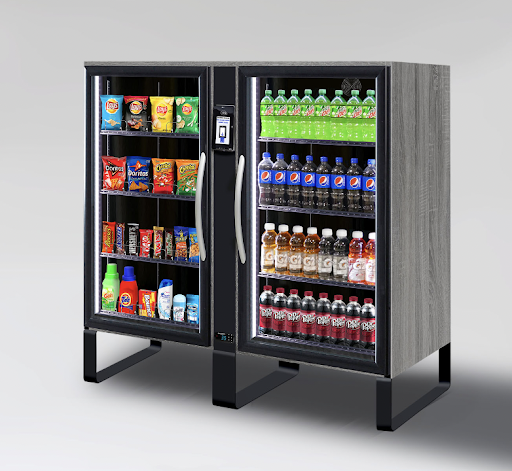 A vending machine with snacks on the left side and beverages on the right side, stocked with chips, cookies, and various bottled drinks.