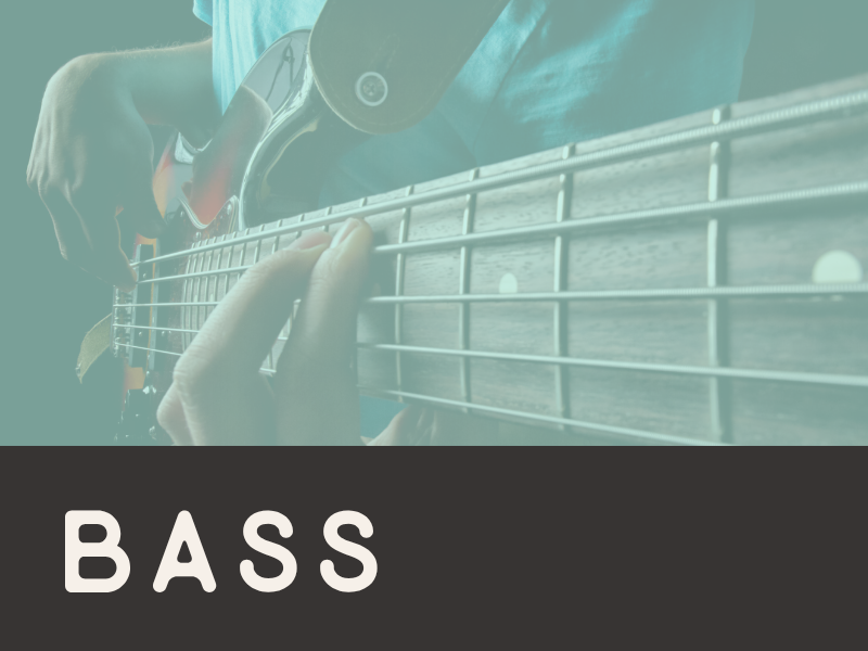 Close-up of a person playing a bass guitar, focusing on their hand on the fretboard and the strings.