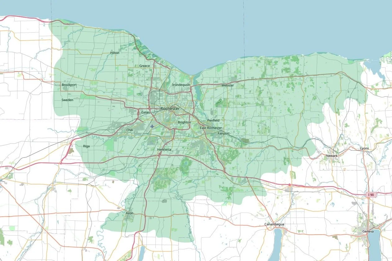 Map of Rochester, New York, showing surrounding neighborhoods, major roads, and green areas.
