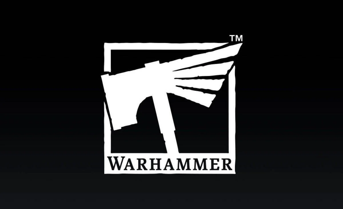 Black background with white Warhammer logo featuring a stylized hammer and wings, and the word "WARHAMMER" underneath.
