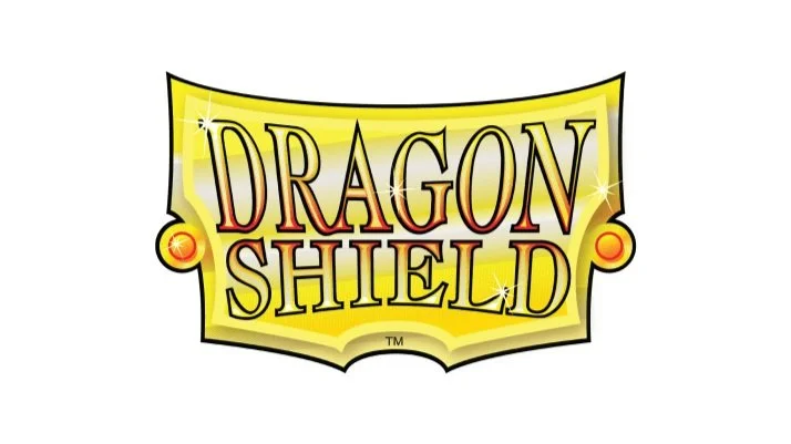 Logo of Dragon Shield with bold yellow and red text on a yellow shield background.