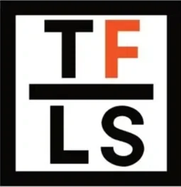 Logo with the letters T, F, L, and S arranged in a grid with black, white, and orange colors.