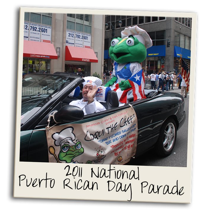 Tania Lopez wearing the six-foot Coqui the Chef® mascot costume during a community event in New York City.