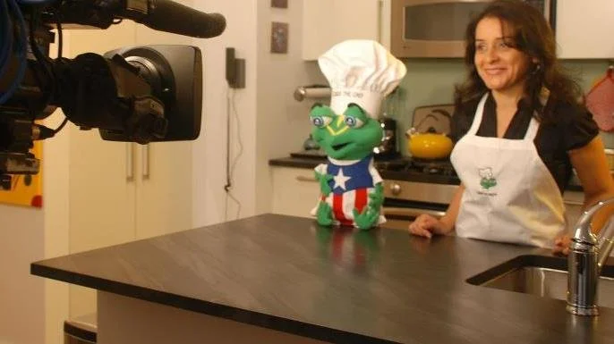 Coqui the Chef® puppet created to support food education and cultural storytelling.