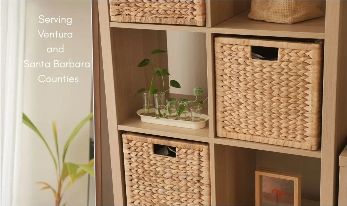 A wooden storage shelf with woven baskets and a small plant in a white tray. Text on the left side reads 'Serving Ventura and Santa Barbara Counties'.