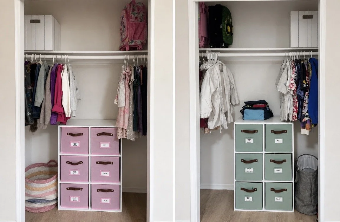 Open closet with hanging clothes, storage bins, and a laundry basket.