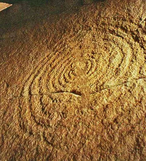 Close-up view of the carved spiral petroglyph on Fajida Butte in New Mexico.