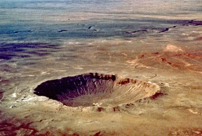 Aerial view of Meteor Crater, east of Flagstaff, Arizona, in a desert landscape.
