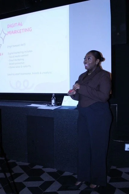 Shomoy delivering a Money Confidence workshop at a Mum Stop Shop coffee morning