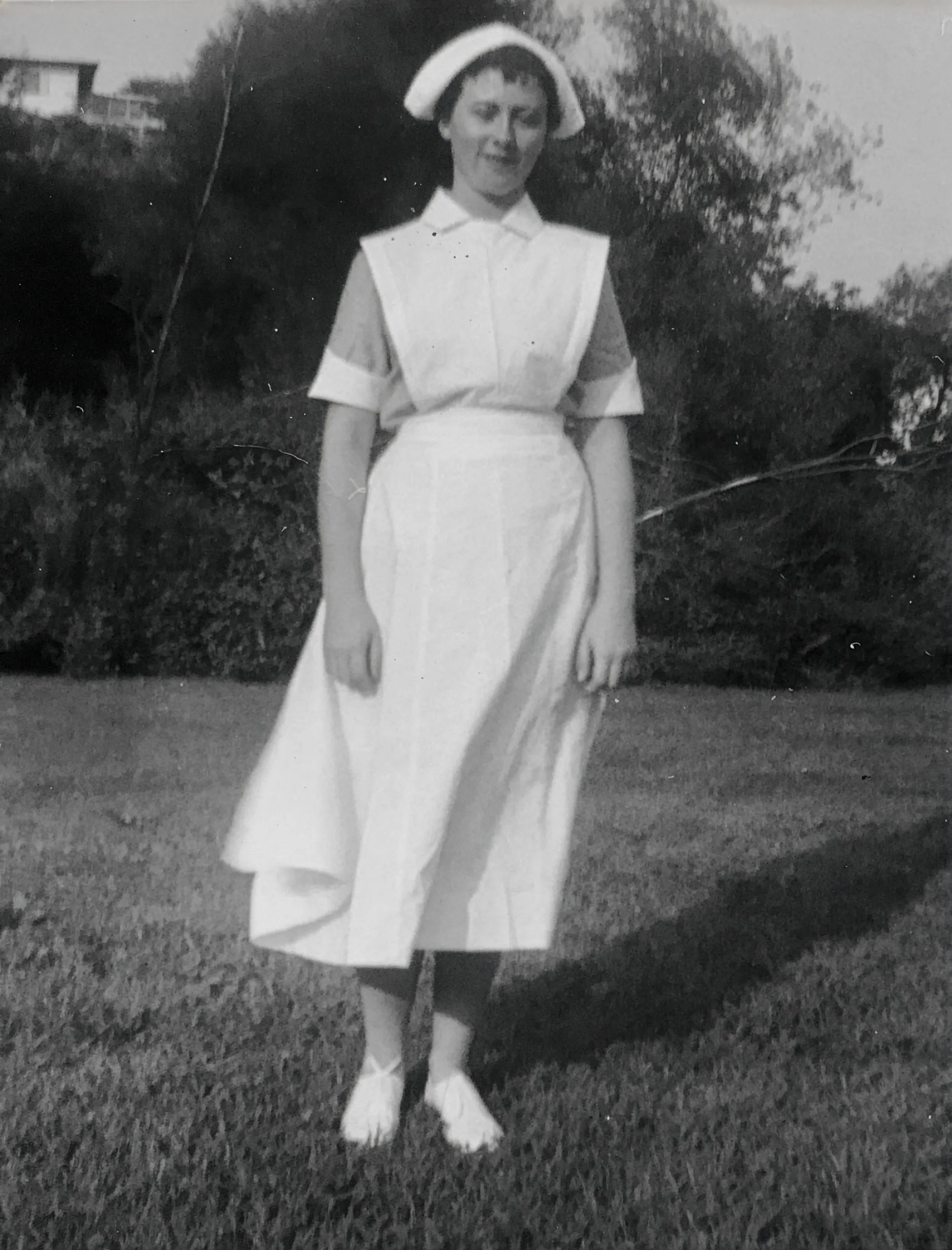 Peggy Krachy, the inspiration behind the The Margaret "Peggy" Krachy Children's Charity (aka the Peggy Principle) shown here in a black and white photograph of her as a nurse.
