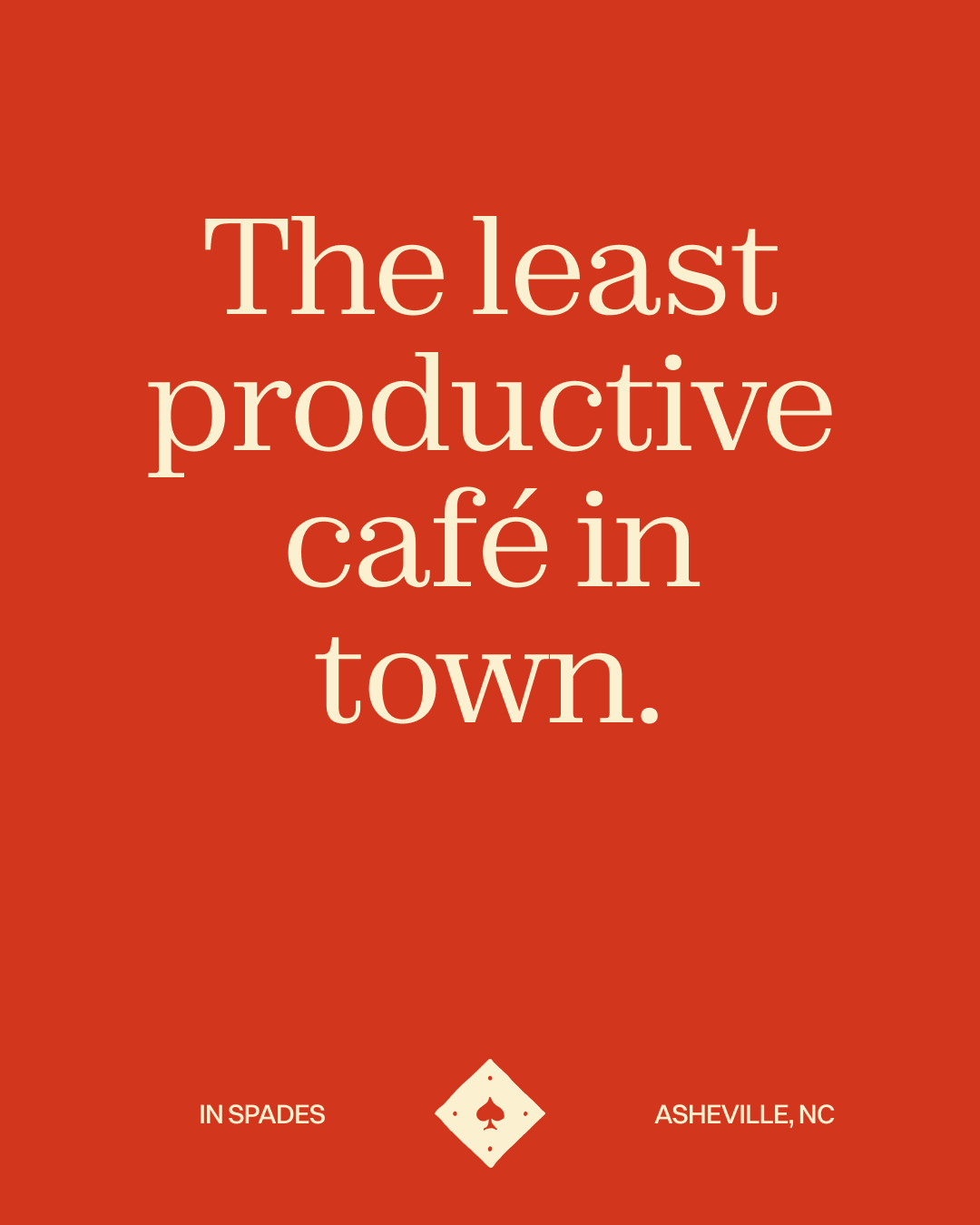 Red background with white text that says, "The least productive café in town." In the bottom corners, white text reads, "IN SPADES" on the left and "ASHEVILLE, NC" on the right. In the center bottom, there is a small white diamond shape with a spade symbol inside.