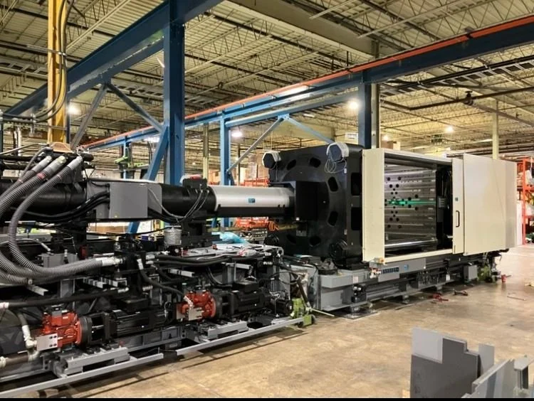 Large industrial machine in a factory setting.