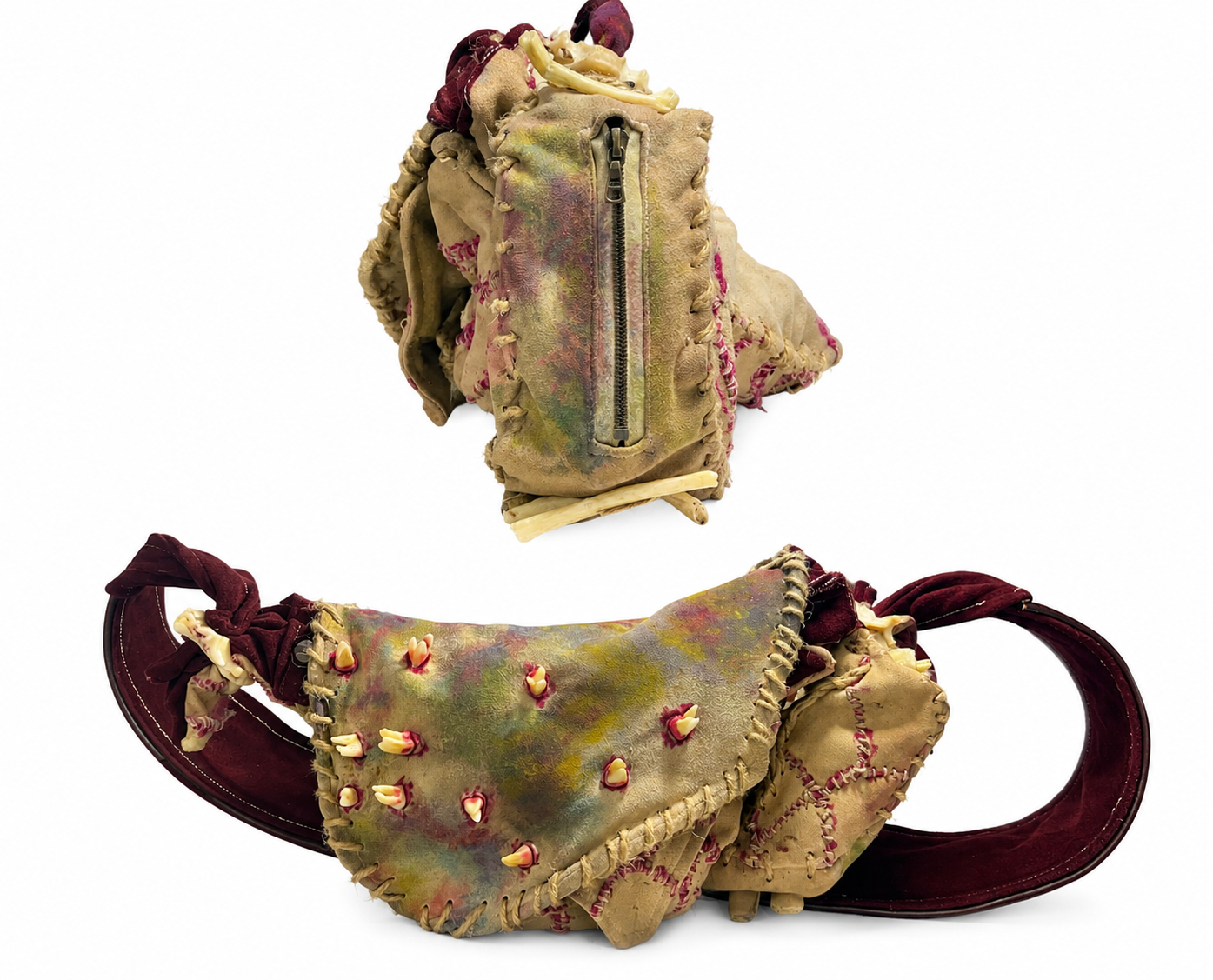Two desgined, worn-out bags with a fabric and leather look, decorated with embroidery, beads, and hand-stitched patterns, set against a plain white background.