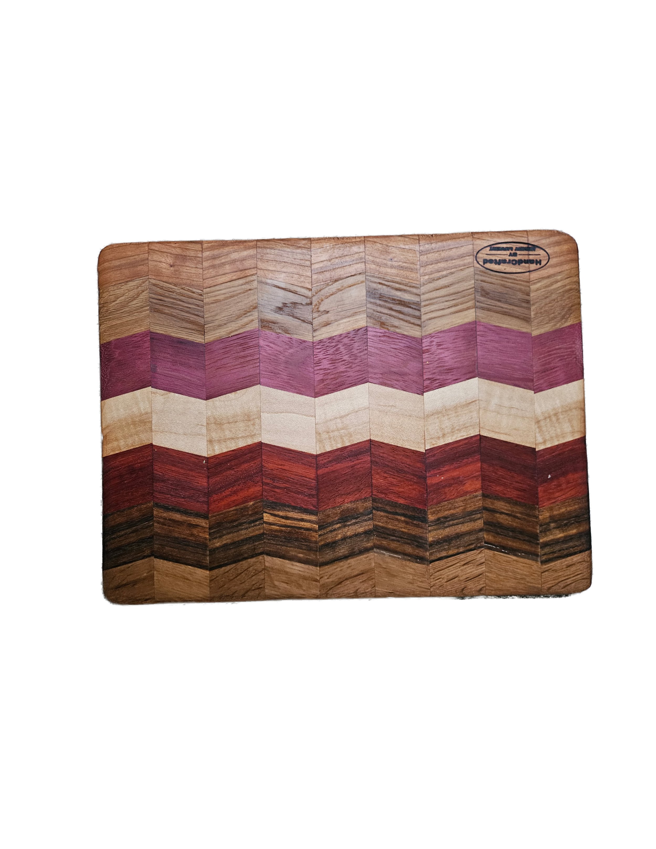 A square wooden puzzle with a multicolored, zigzag pattern in various shades of brown, red, pink, and beige.
