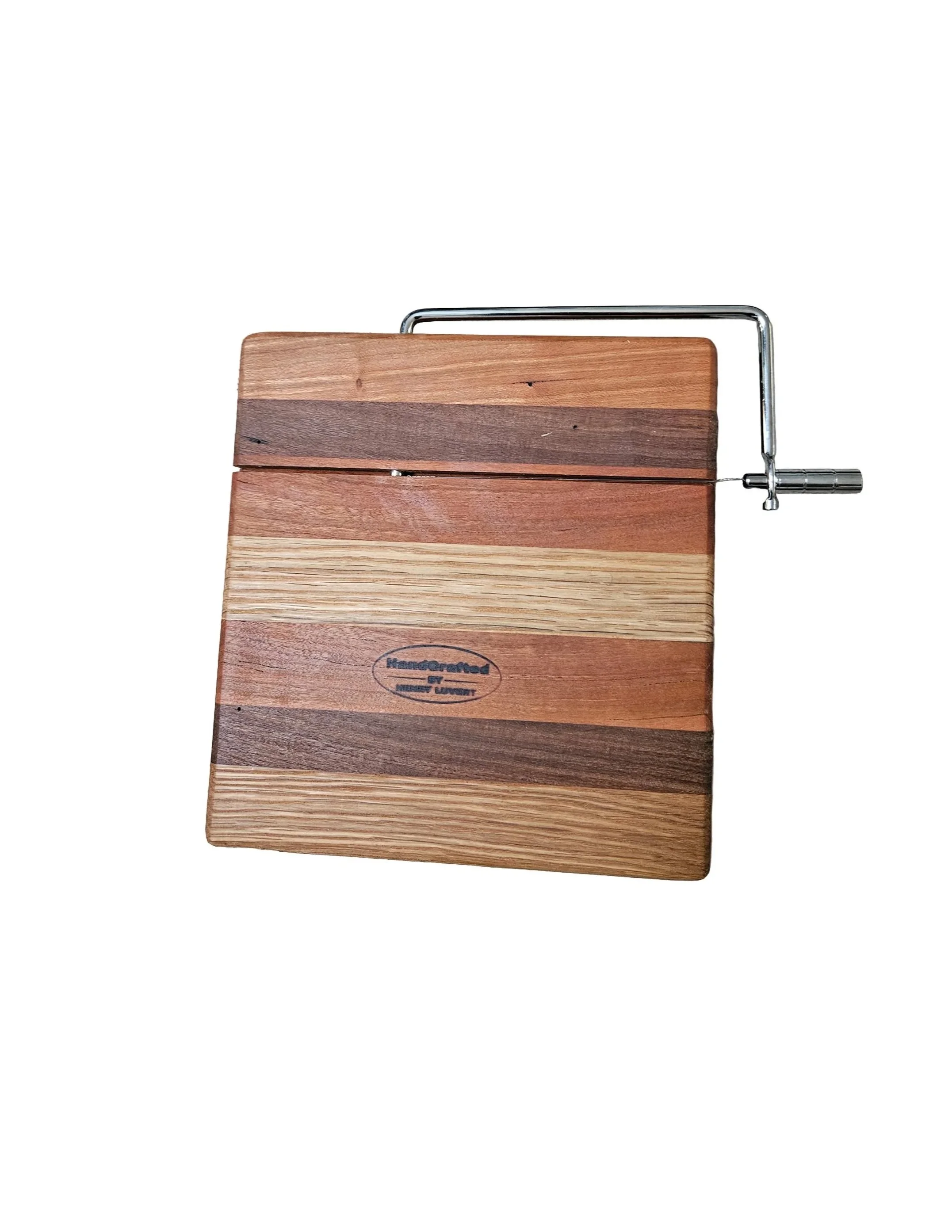 Wooden cutting board with a metal clamp attached on the right side, against a white background.