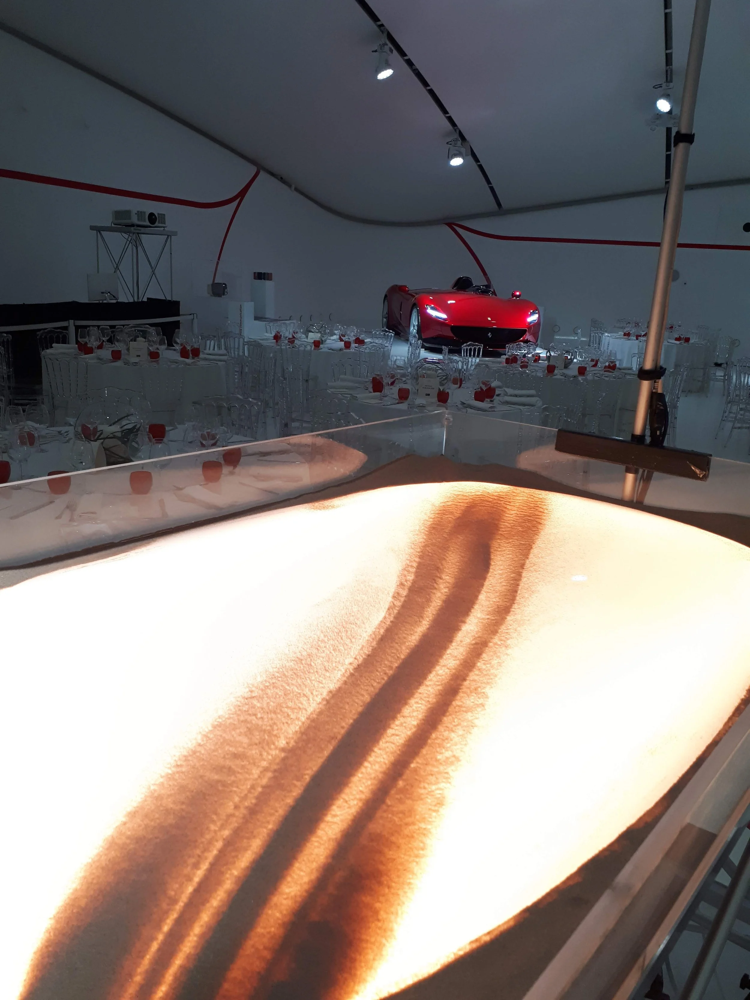 sand-art-nadia-pretto-artist-museo-ferrari-corporate-event.jpg