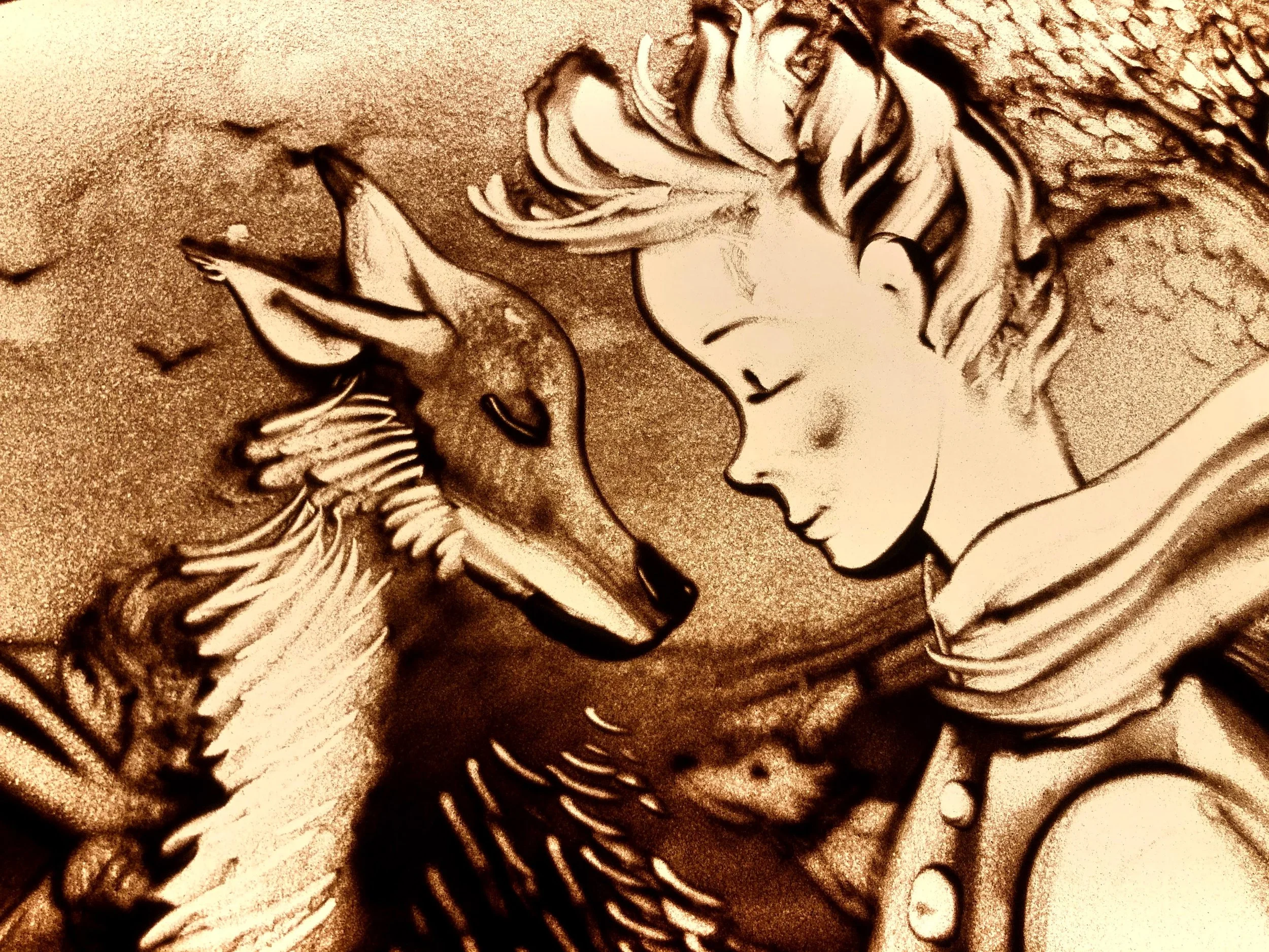 Il Piccolo Principe e la volpe disegnati nella sabbia da Nadia Pretto artista.