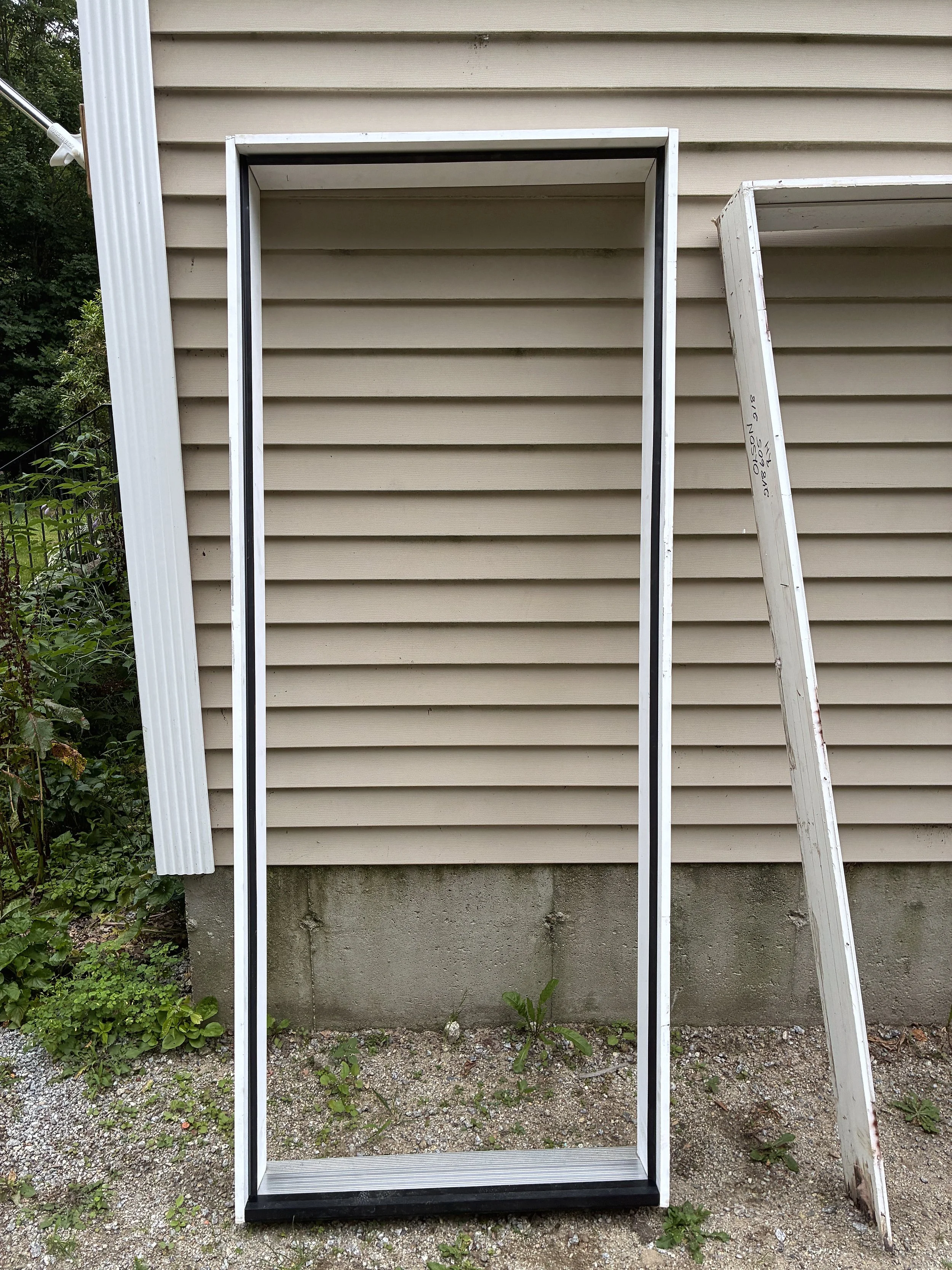New frame was cut to size and put together. This frame features PVC protection at the base to prevent any future rotting.