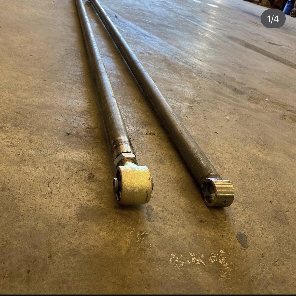 Traction bars with rubber bushings and johnny joints raw steel