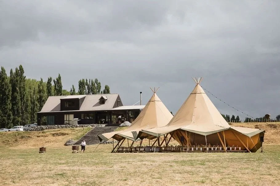 A large Nomad canvas tent or yurt on the sprawling lawn of Rathmoy Estate's Riverside Lodge in Rangitikei near Manawatu.