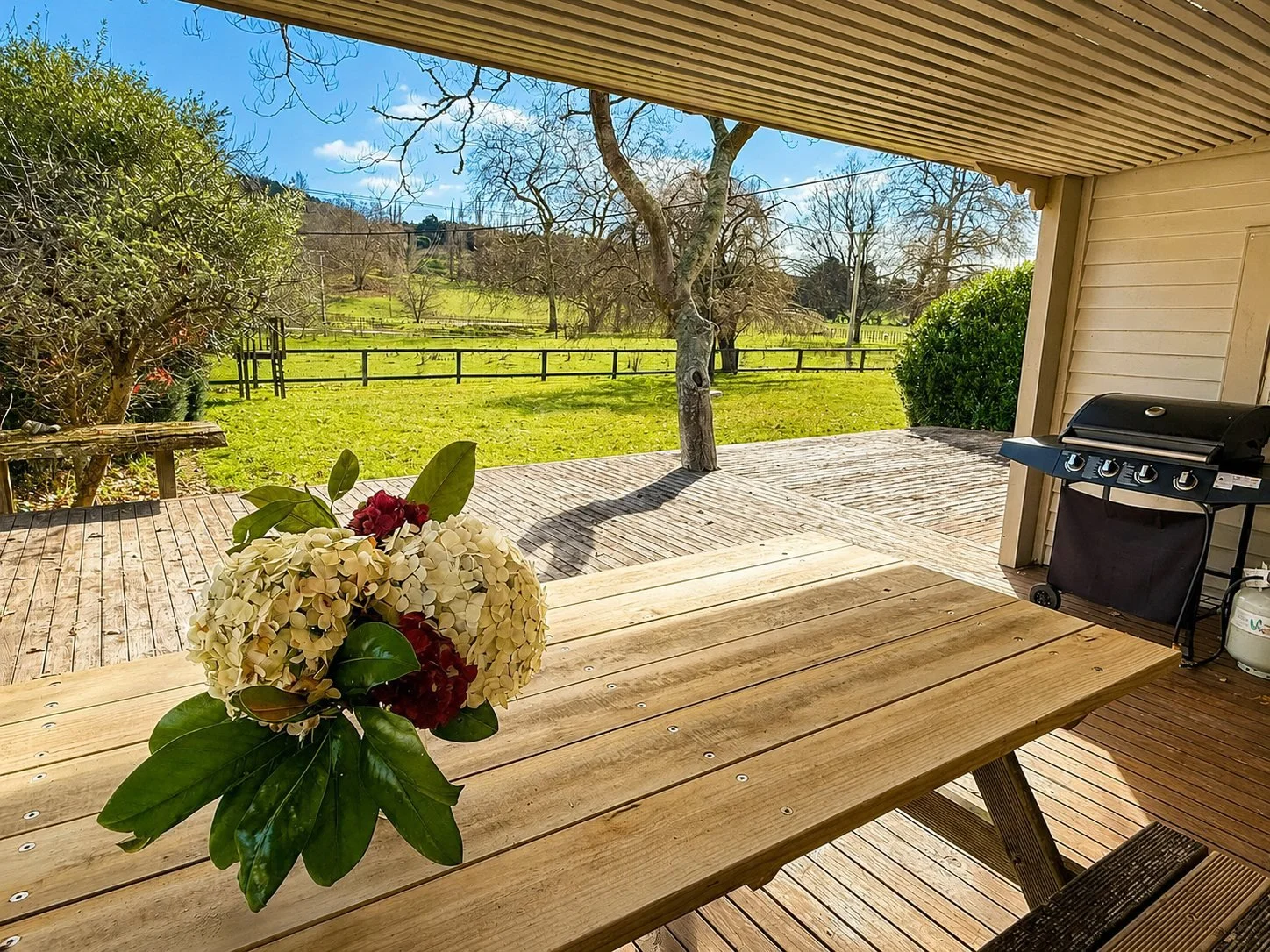 Rathmoy Farmhouse deck and farm view in Rangitikei near Manawatu.