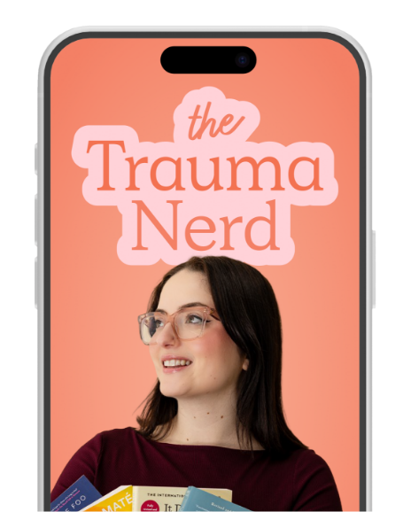 A woman with long dark hair and glasses holding books on a smartphone screen. The background is pink with the text 'the Trauma Nerd' at the top.