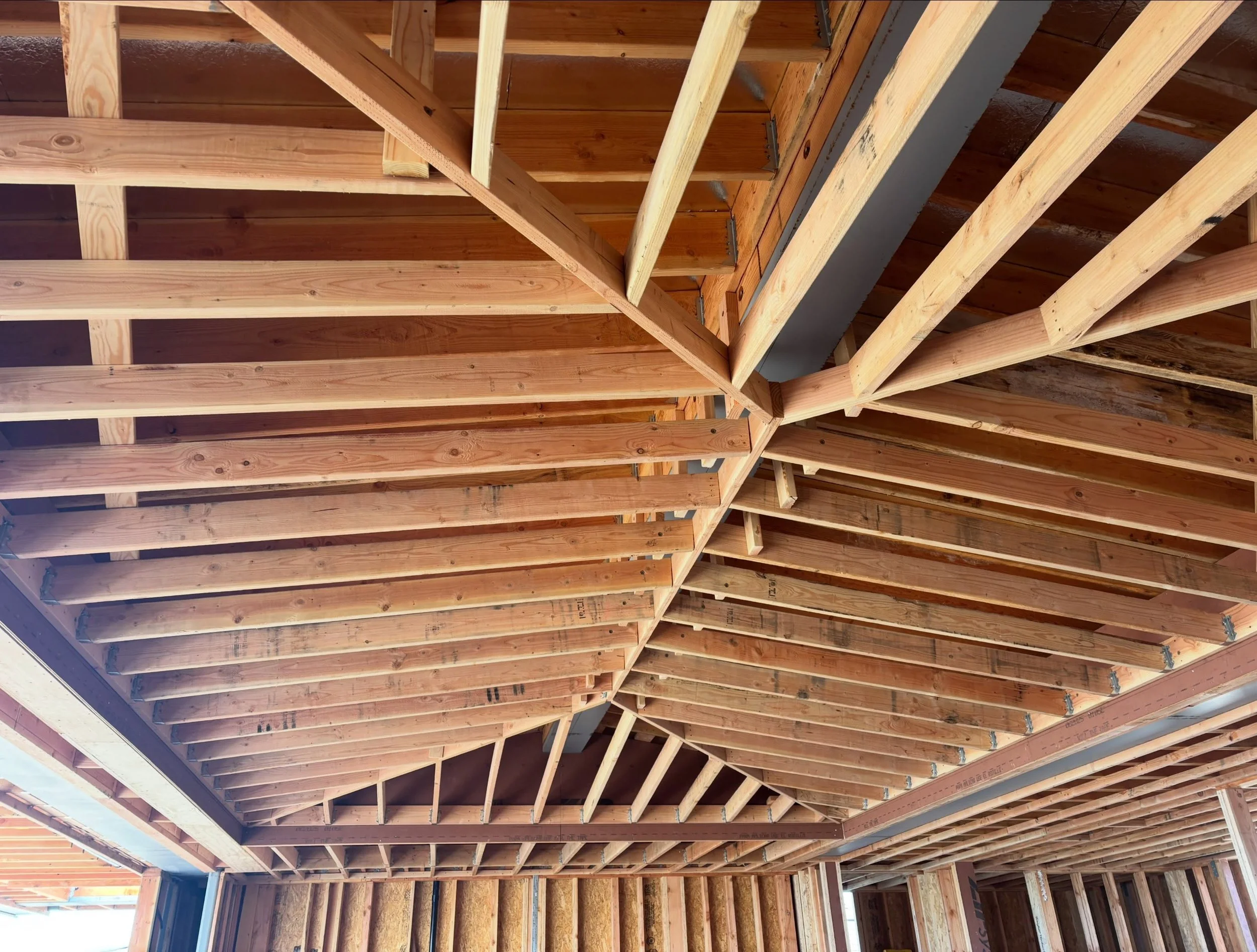 Building it right starts with the framing 

This custom intersecting vaulted ceiling takes careful planning, precision framing, and attention to detail long before the finishes go in. Every angle has to come together perfectly to create the open, dra