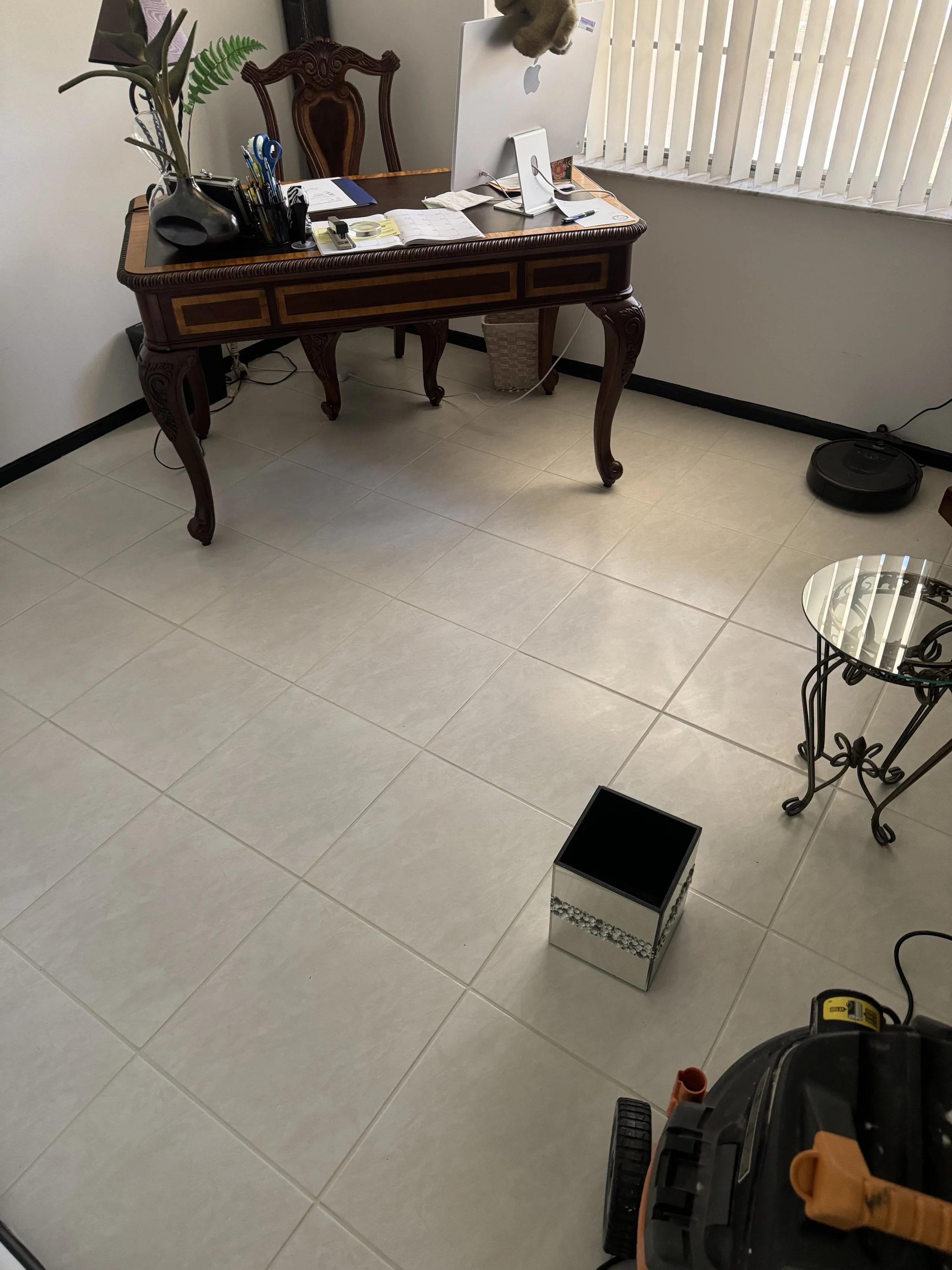 Residential office tile floor deeply cleaned and sealed in Coral Springs.