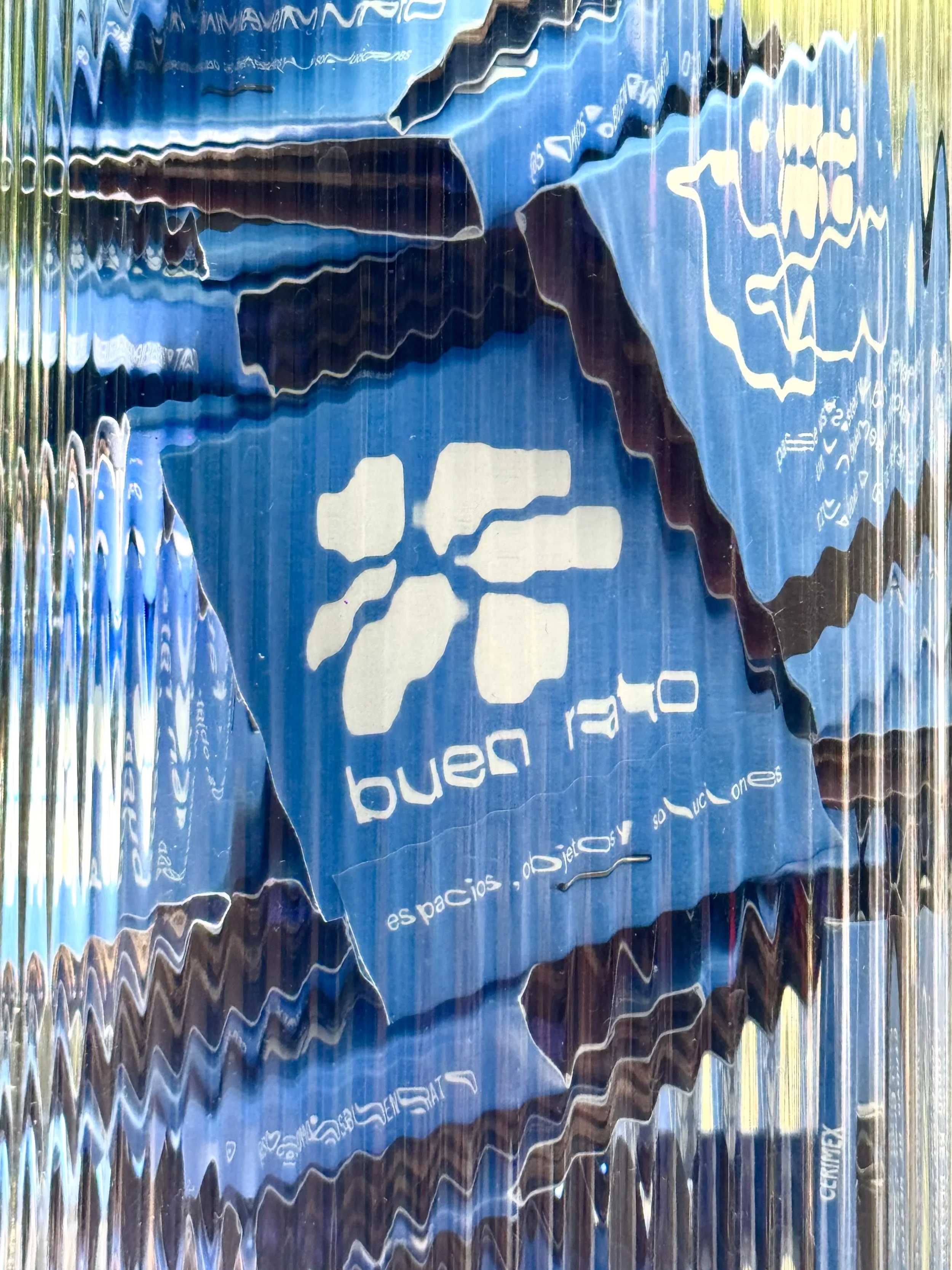 Abstract blue and white design with wavy lines and text that has our logo and branding. This is our business cards.