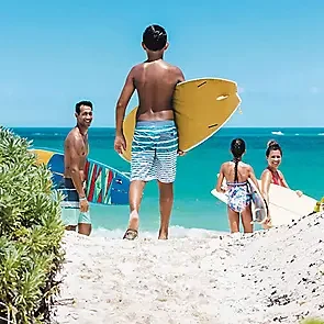 mexico-family-surfing-beach.webp