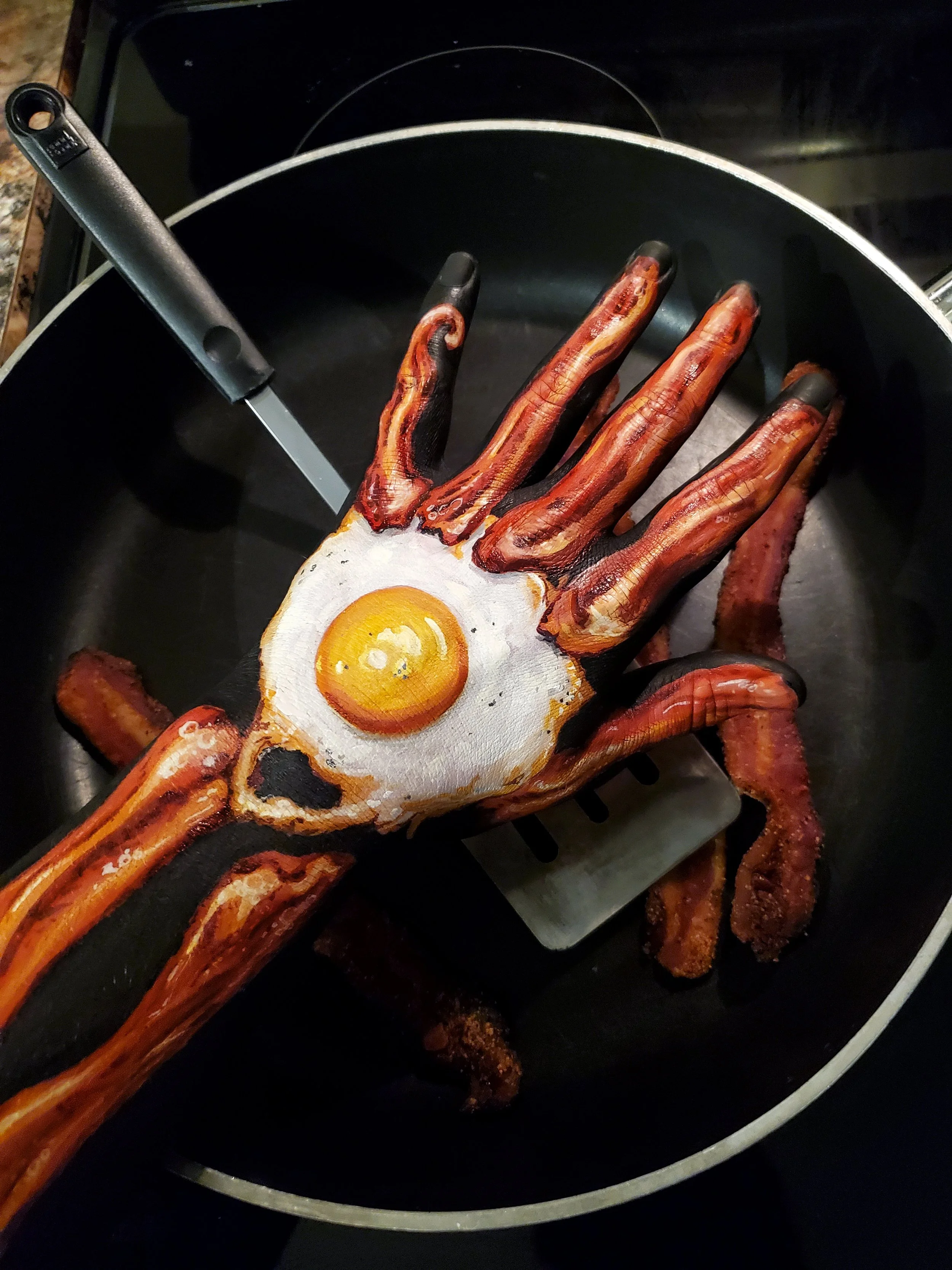 food hand bacon and eggs illusions that makes human hand look like food. Body painting sfx makeup special effects makeup witte artistry madison wisconsin makeup artist