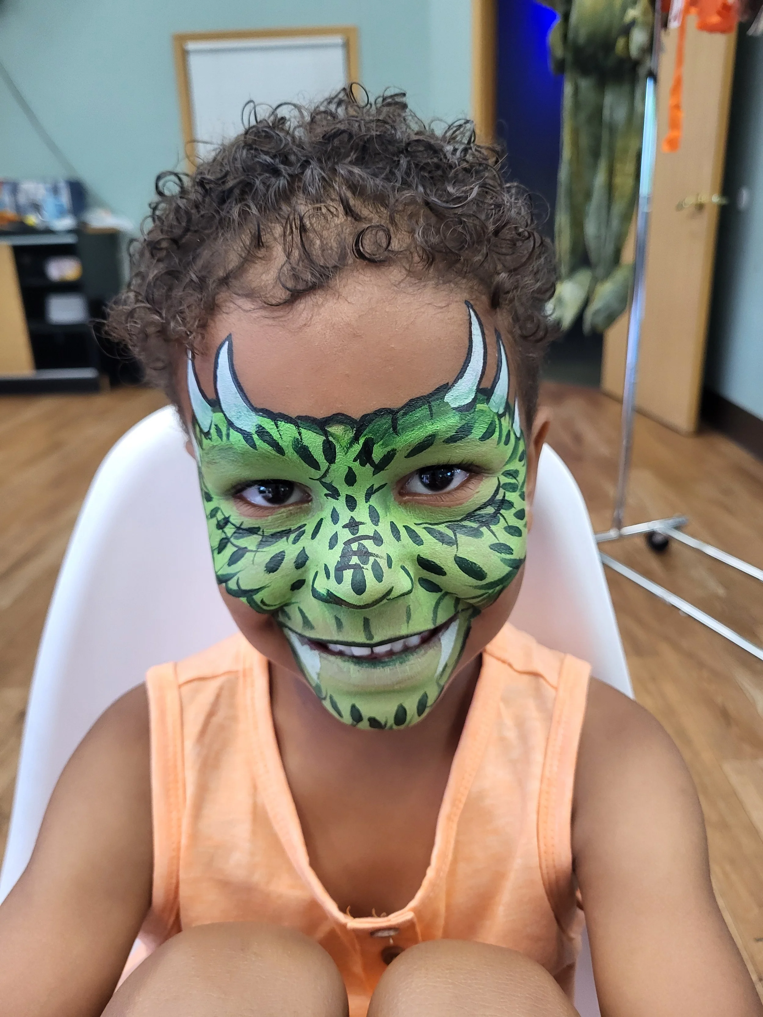 dinosaur face painting for a boys birthday party dance recital madison wisconsin witty kitty face painting witte artistry