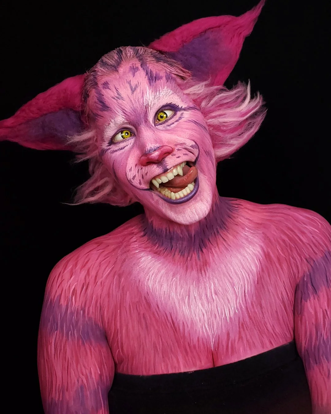 Pink cat makeup illusion inspired by the cheshire cat witte artistry face painter madison wi