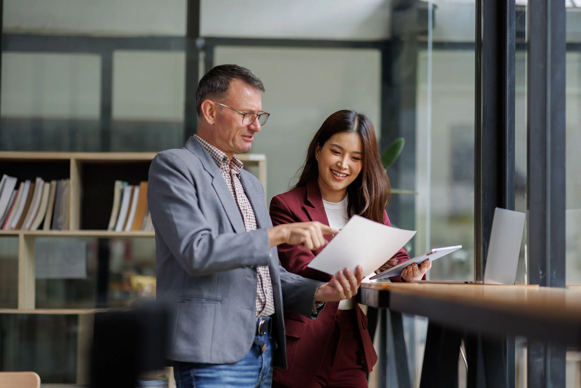 Business man consulting with a female business owner.