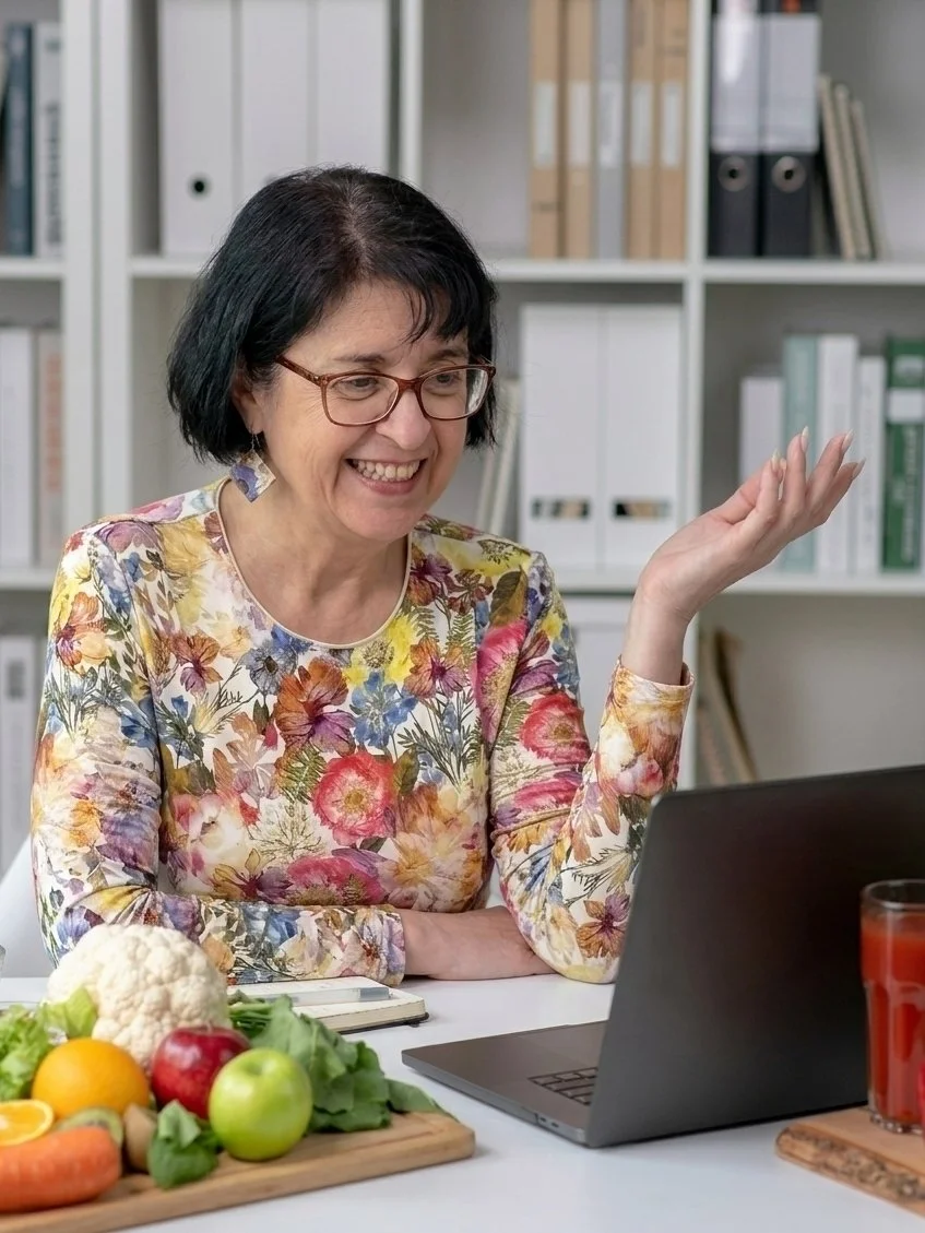 Clinical nutritionist delivering functional testing results via video call