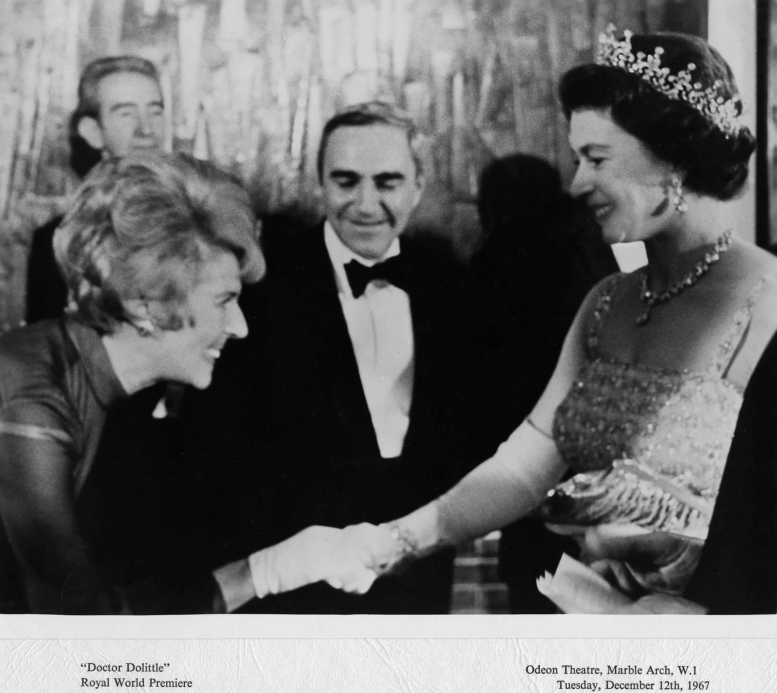 Mickey Fleischer, with Richard, meeting Queen Elizabeth at the London premiere of Dr. Dolittle