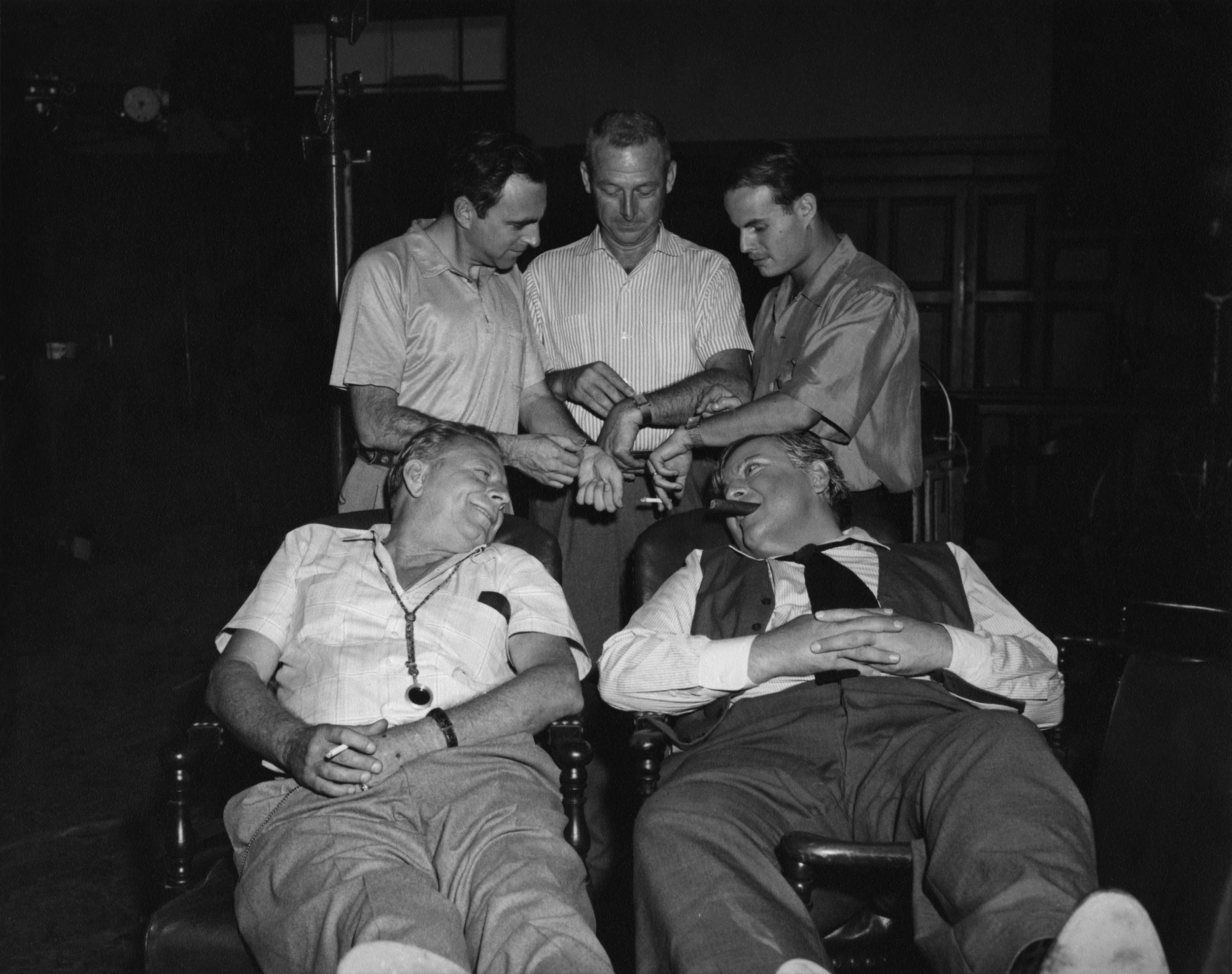 On the set of Compulsion, with Richard Zanuck (upper right) and Orson Wells (lower right)